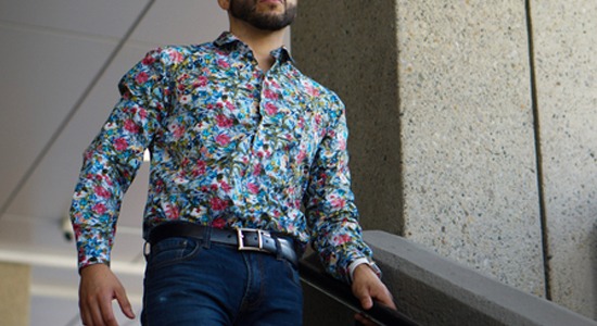 man-wears-colorful-shirt-while-walking