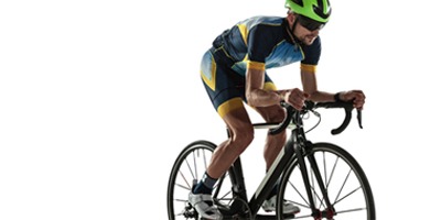 man-rides-bike-wearing-digitally-printed-bicycling-clothing