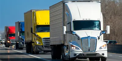 colorful-trucks-on-highway