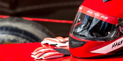 plastic-race-car-helmet-on-racecar